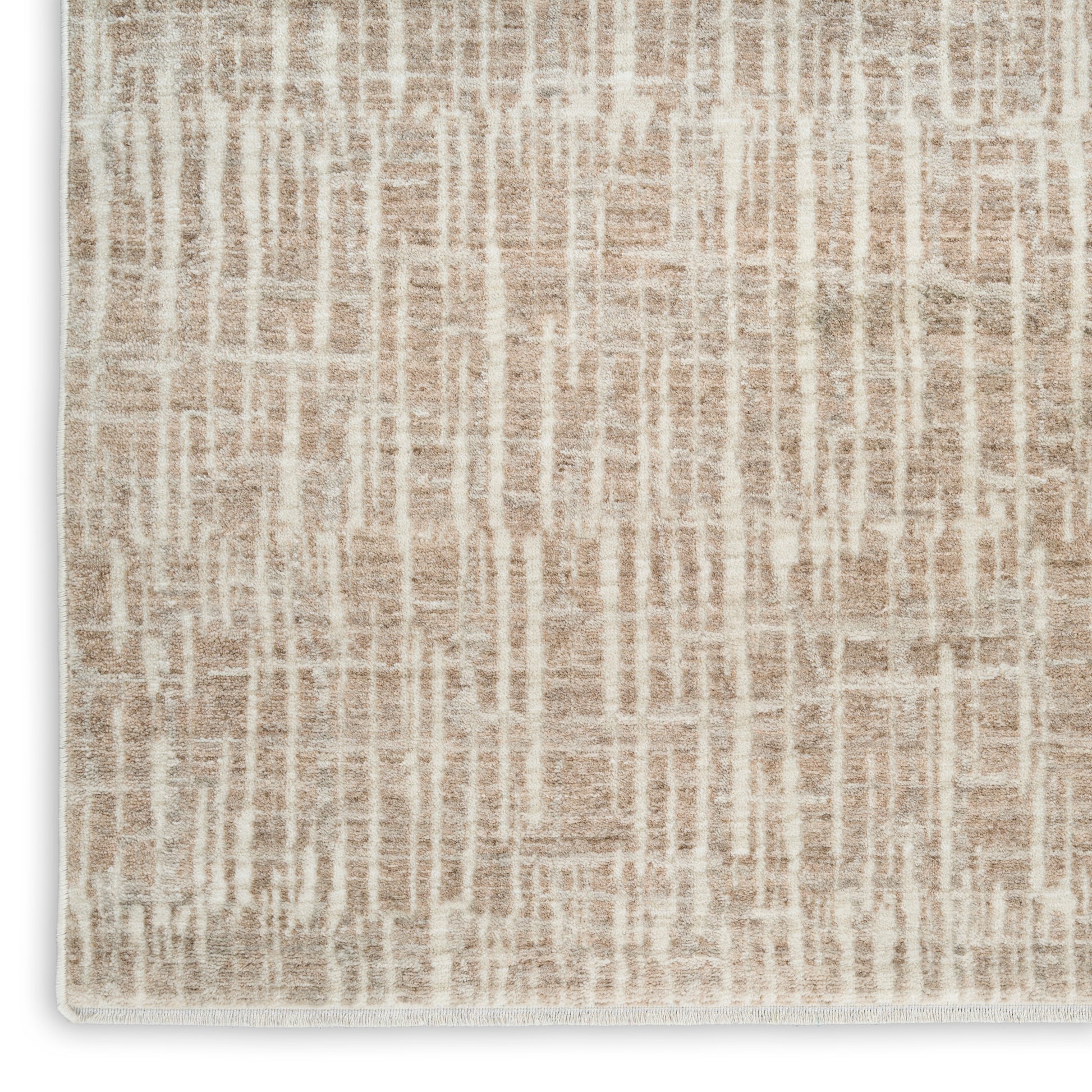 Beige abstract patterned area rug with cream lines, soft textured pile and subtle fringe along edges.