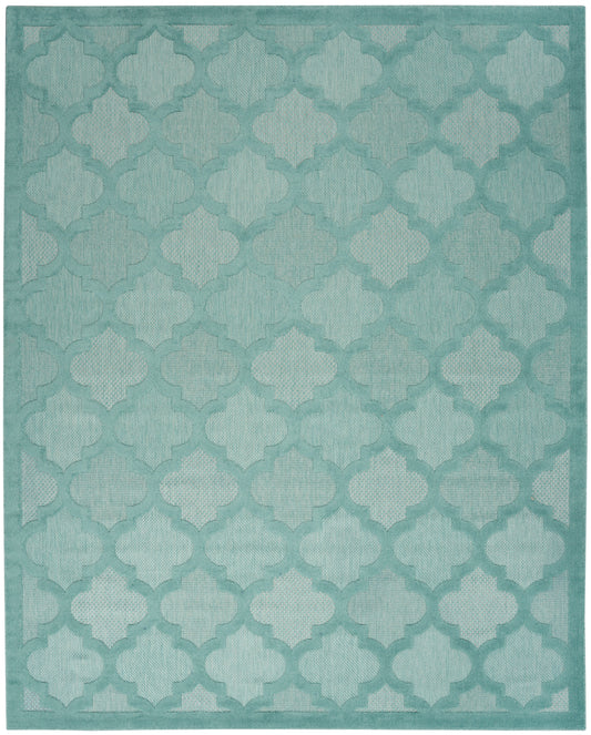Teal seafoam rectangular area rug with a repeating trellis quatrefoil motif and subtle gradient border.