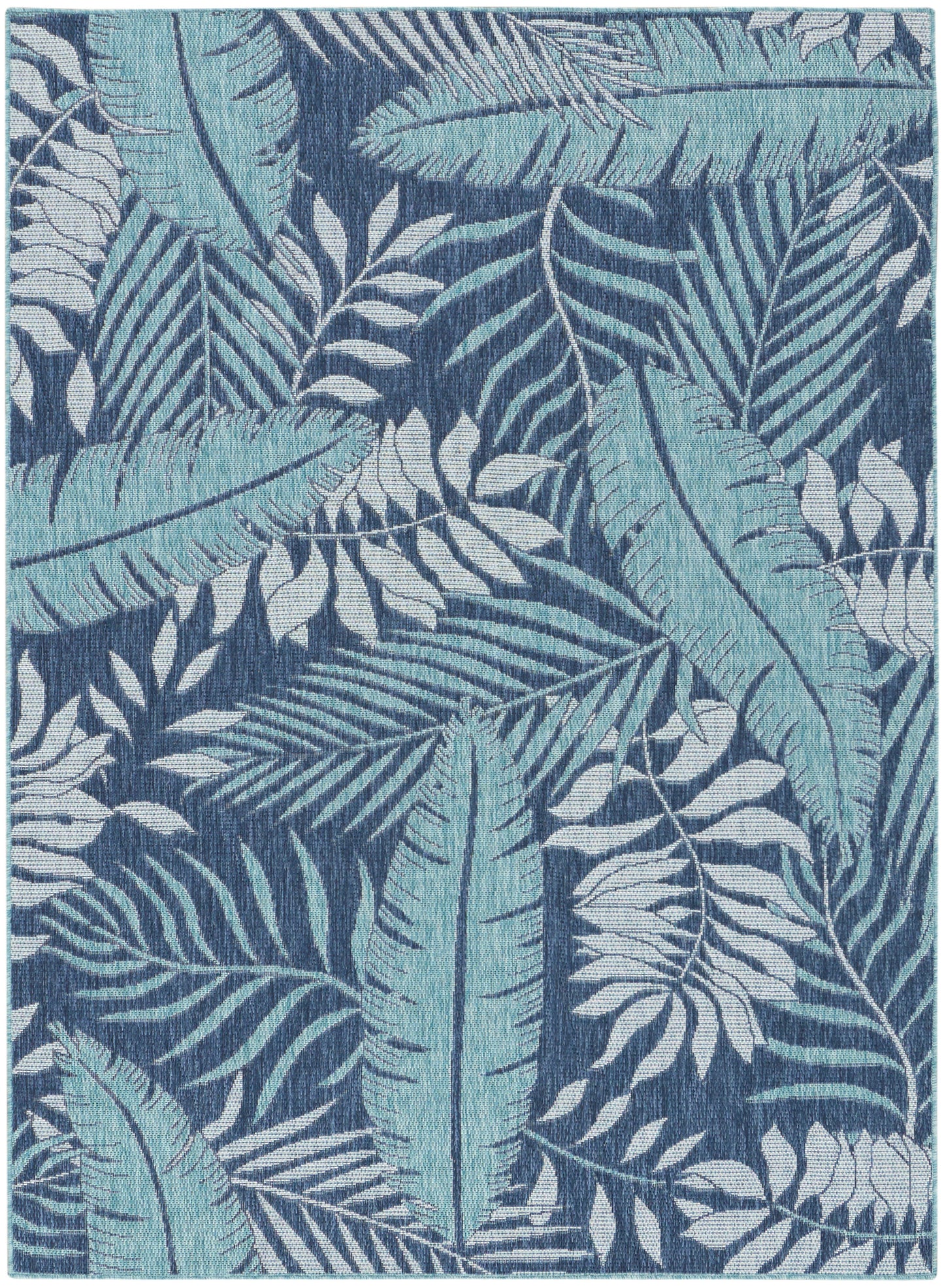 Rectangular woven rug with teal and light-blue tropical leaves on a dark navy background.