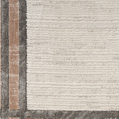 Beige textured area rug with vertical charcoal-gray and tan stripe accents along the left edge.