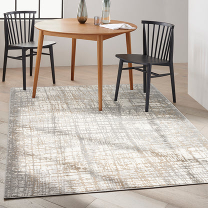 Beige-gray patterned area rug, 8' x 10'.