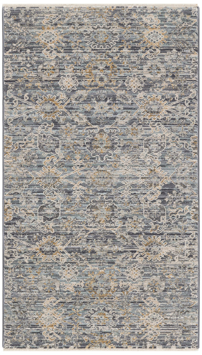 Rectangular blue-gray distressed floral rug with ivory and tan accents; vintage oriental style, fringed edges.