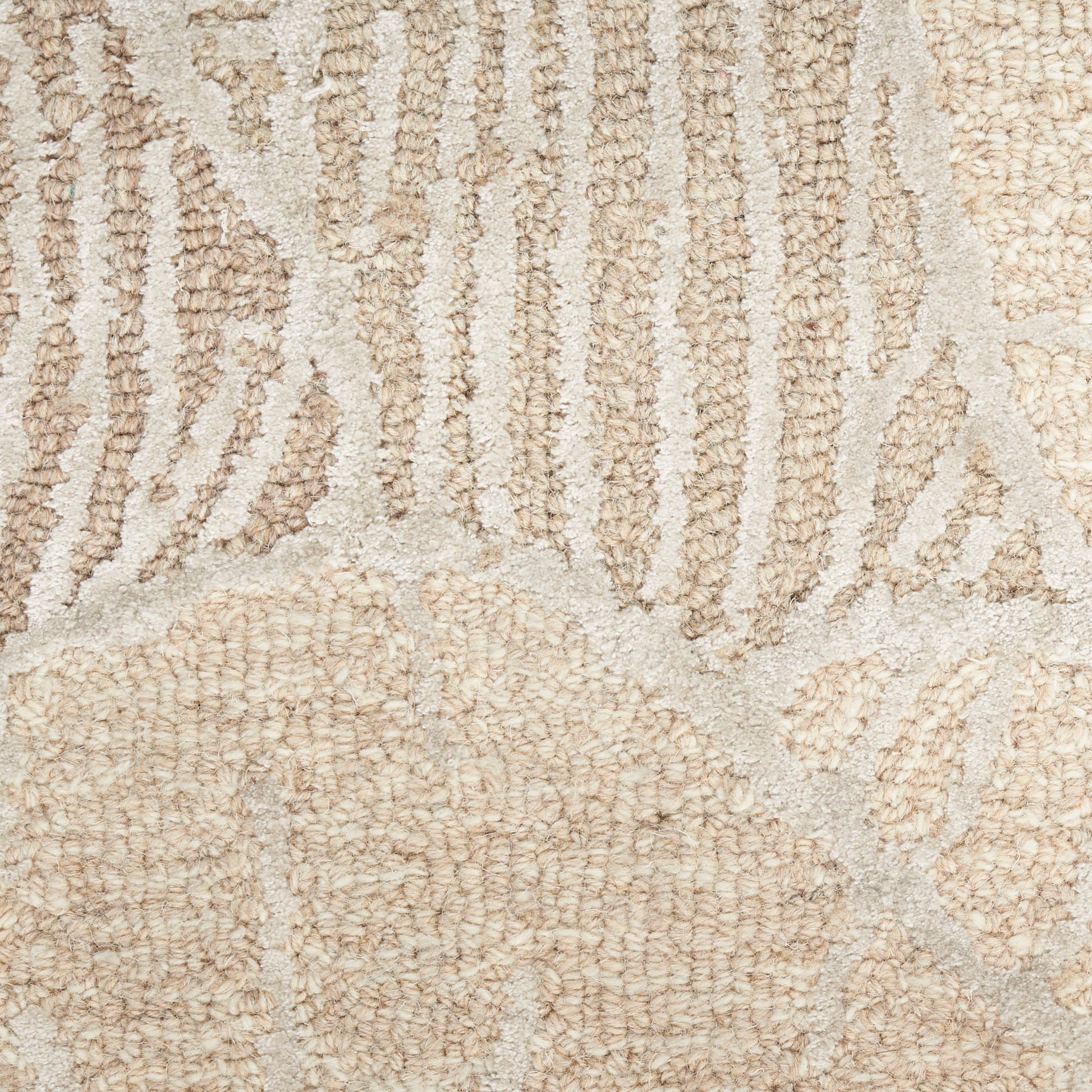 Beige textured runner rug with cream raised loop pattern in abstract shapes; soft woven pile.