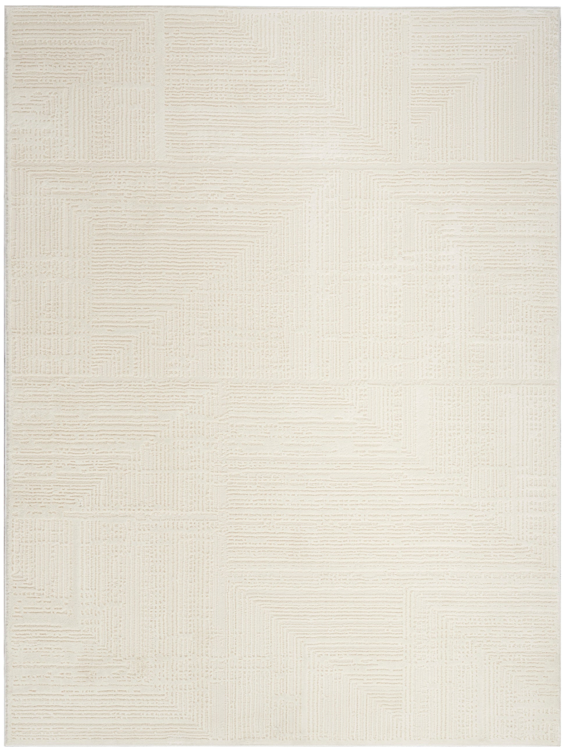 Cream textured area rug with geometric patchwork blocks and raised linear patterns for modern neutral interiors.