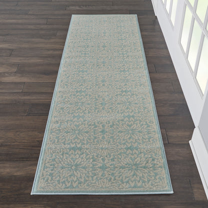 Teal runner rug with beige damask pattern & pale blue border on dark hardwood floor