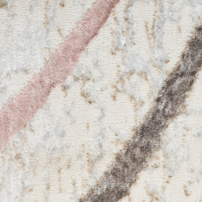 Beige textured woven rug with pink and charcoal diagonal stripes; soft boucle look for living room decor.