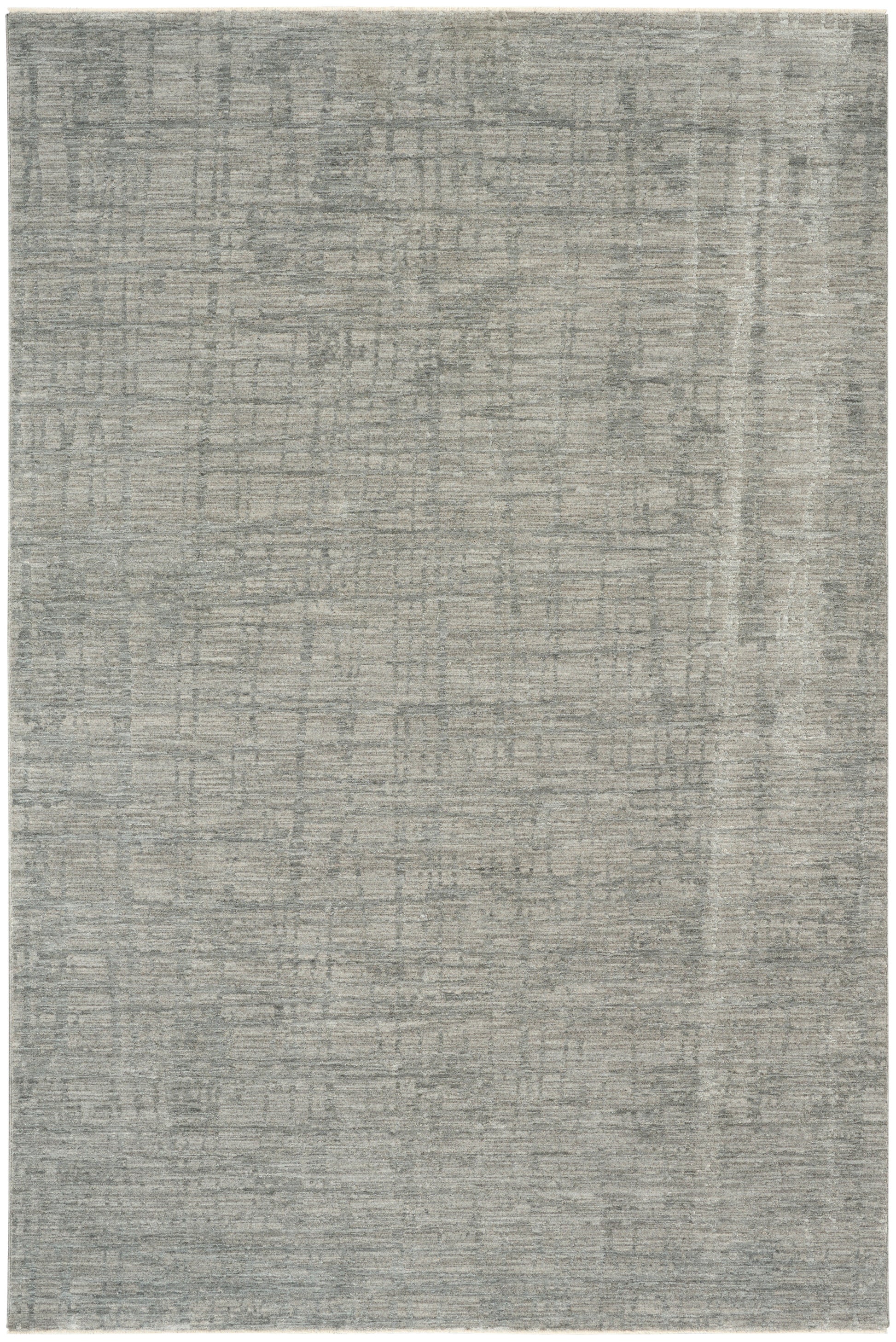 Rectangular grey distressed area rug with subtle weathered pattern in light and dark gray tones.