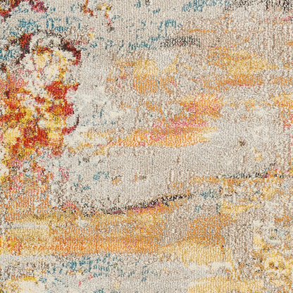 Abstract woven rug with beige base & warm orange, yellow, blue & red patches; textured modern decor.