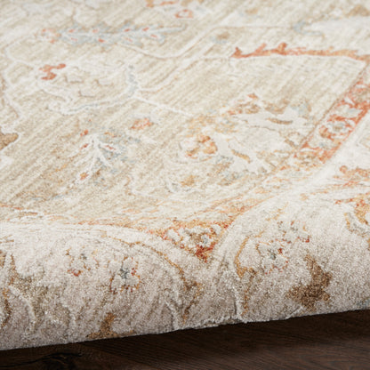 Beige cream oriental rug with subtle orange accents and intricate floral pattern; close-up edge on dark wooden floor