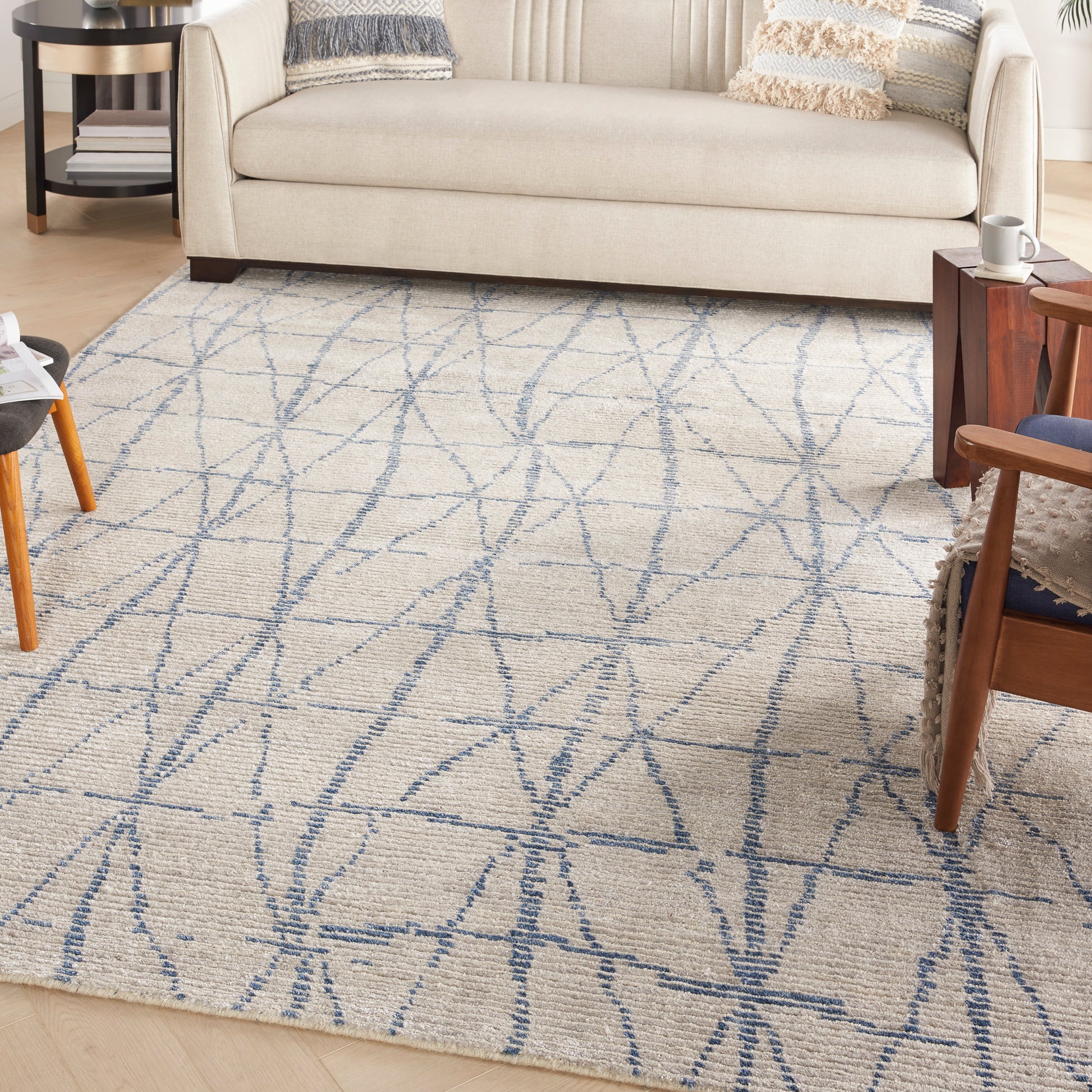 Nourison Ellora 8' x 10' hand-knotted area rug from Primoends with neutral abstract design, wool and rayon blend, modern indoor rug for living room, bedroom, or dining room décor.