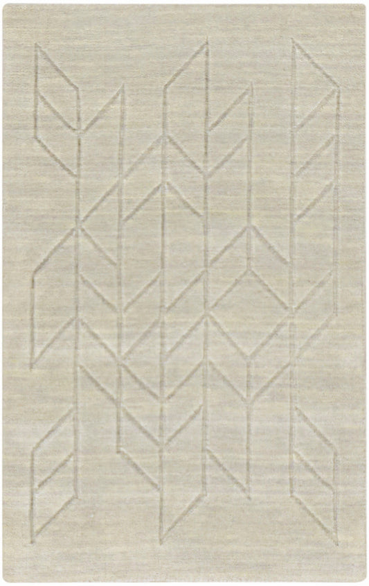 Beige woven rug with raised geometric chevron and diamond pattern; neutral, modern decor.