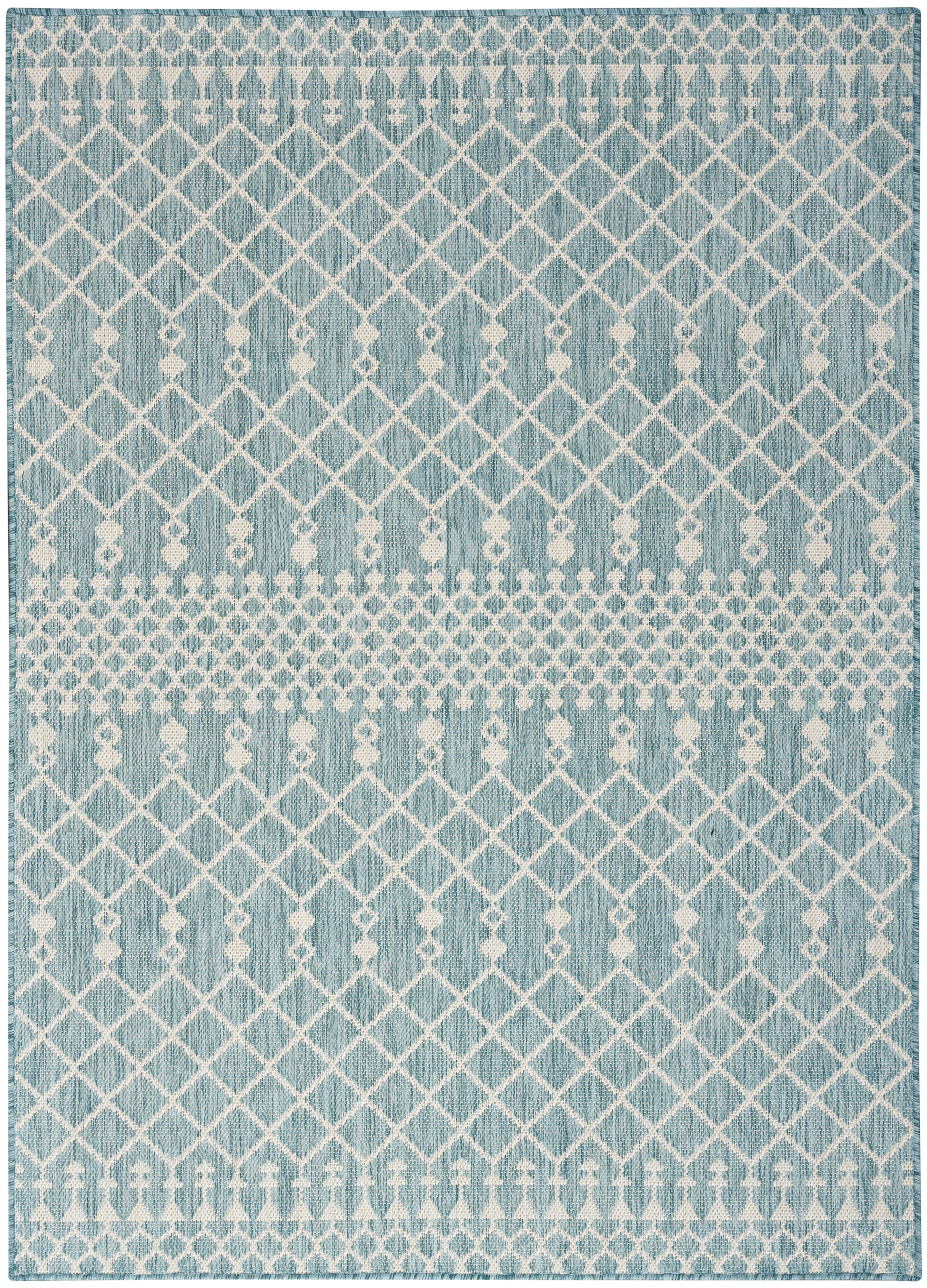 Blue woven rug with white lattice diamonds and dotted bands; rectangular, modern decor.