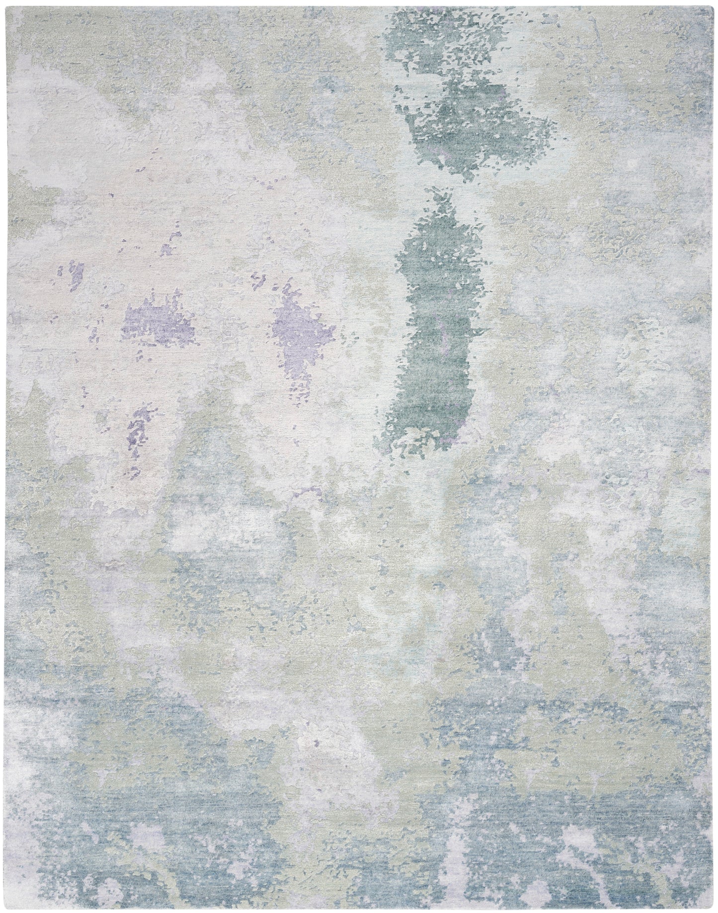 Abstract pastel area rug in blues, creams and lavender with watercolor-style blotches.
