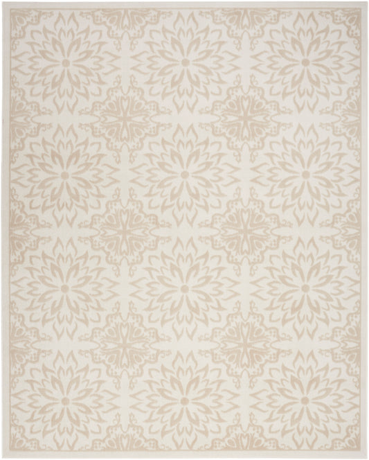 Cream area rug with repeating beige floral medallion pattern and subtle border.
