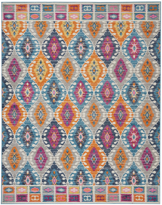 Colorful boho area rug with diamond ikat motifs in orange, teal, blue, purple and pink; bordered by geometric trim.