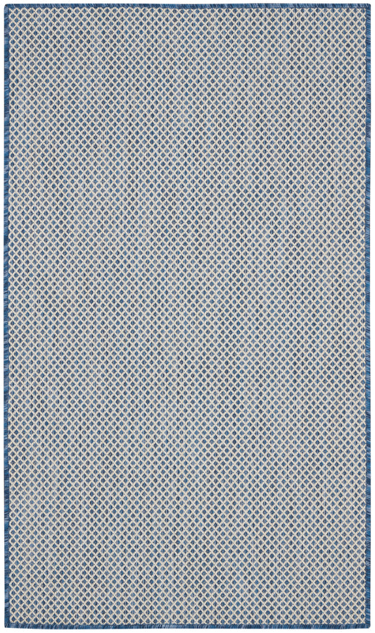 Rectangular blue and white diamond lattice rug with a dark blue border and fringe.