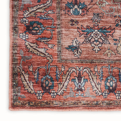 Red oriental rug with teal blue floral motifs & cream accents, decorative border, woven texture.