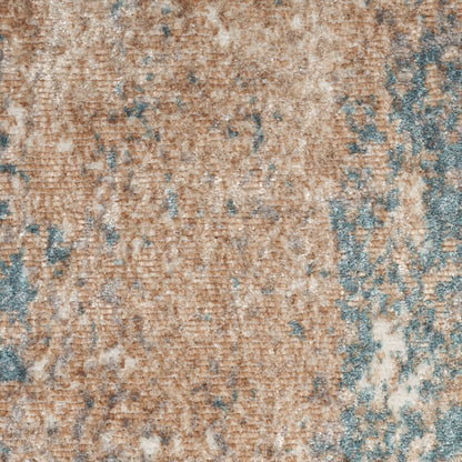 Beige and blue distressed area rug with a textured plush pile in a rectangular modern-vintage style.