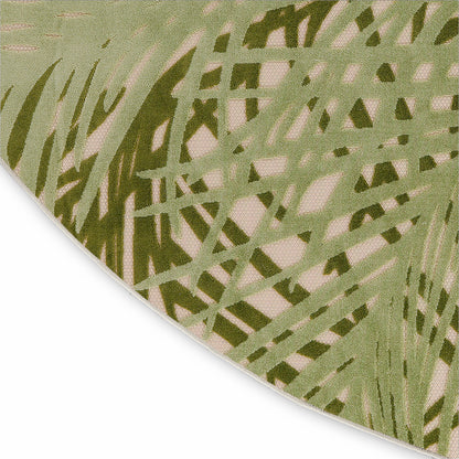 Beige outdoor round rug with olive-green abstract linear print; 5' diameter.