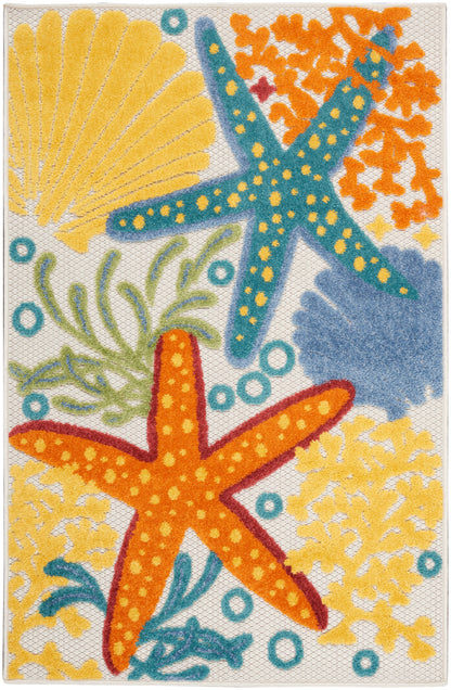 Coastal rug with orange and blue starfish, yellow coral, shell, seaweed and turquoise bubbles on a woven backdrop.