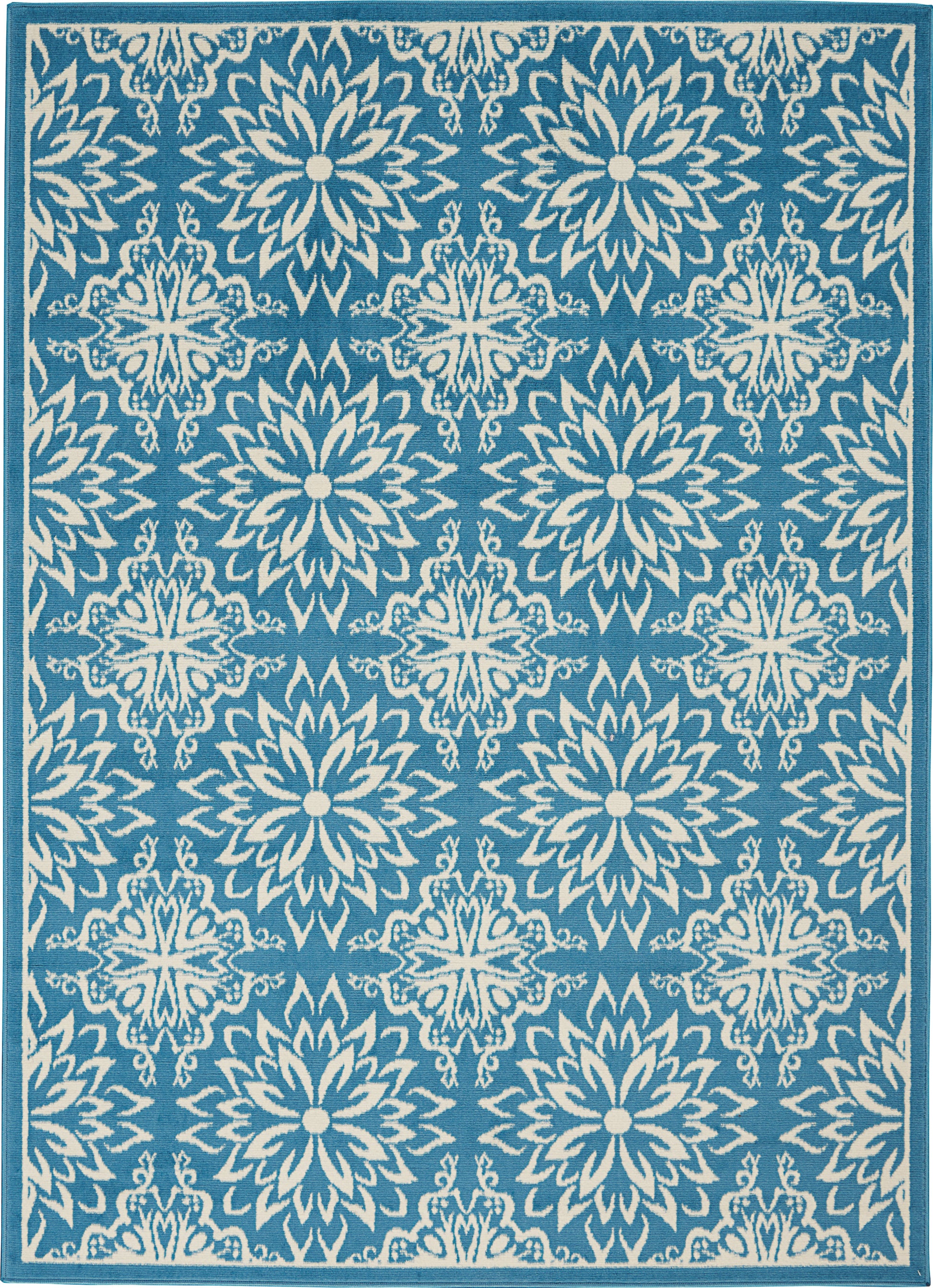 Teal area rug with repeating white ornate floral medallions and border, damask-inspired pattern.