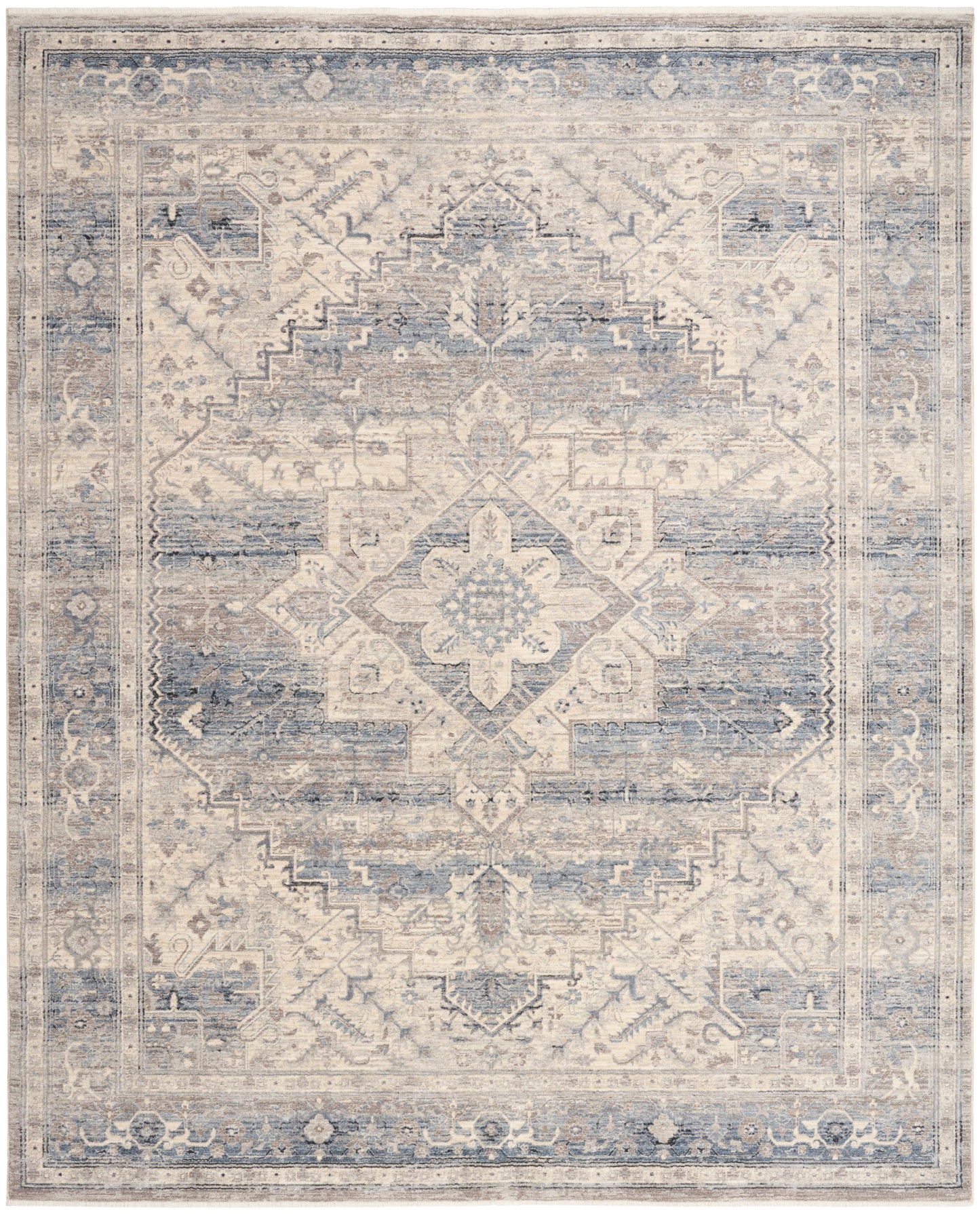 Rectangular vintage-inspired blue and ivory oriental rug with central floral medallion and ornate border.