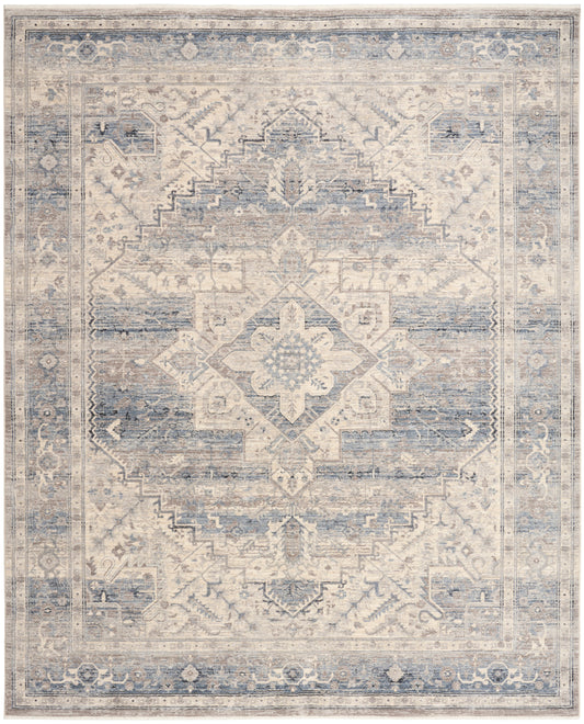 Rectangular vintage-inspired blue and ivory oriental rug with central floral medallion and ornate border.