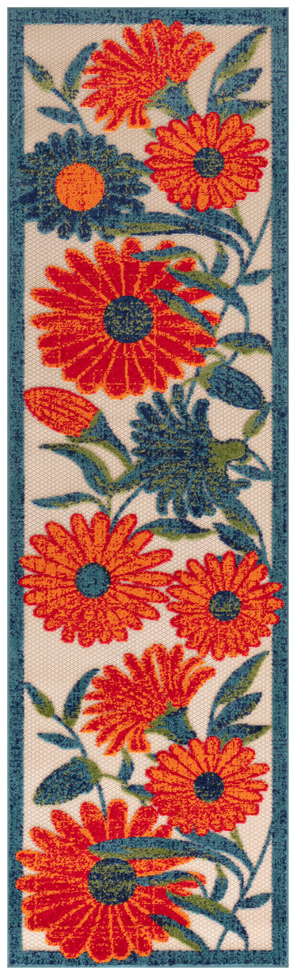 Long rectangular rug with orange-red flowers, blue centers, green leaves on cream background, teal border.