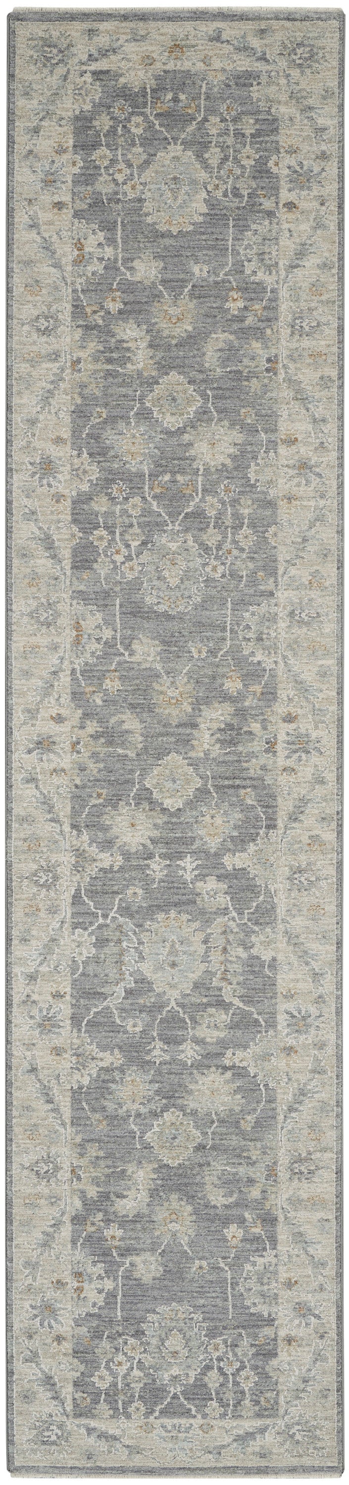 Gray-blue oriental rug runner with ivory floral medallions, light tan accents & decorative border.