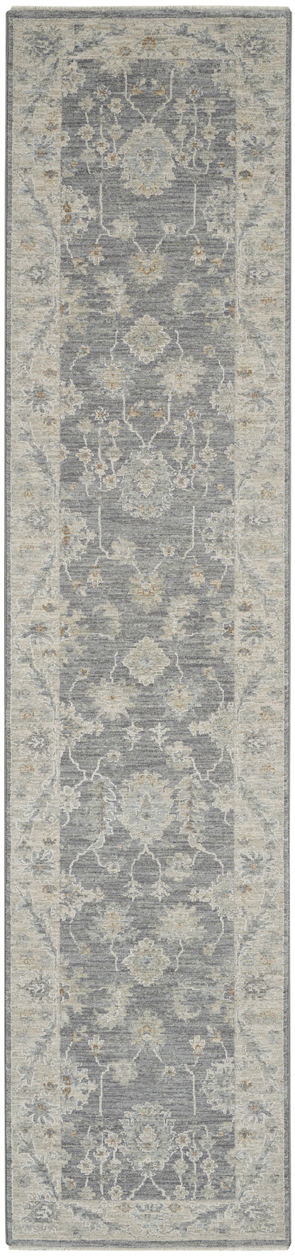 Gray-blue oriental rug runner with ivory floral medallions, light tan accents & decorative border.