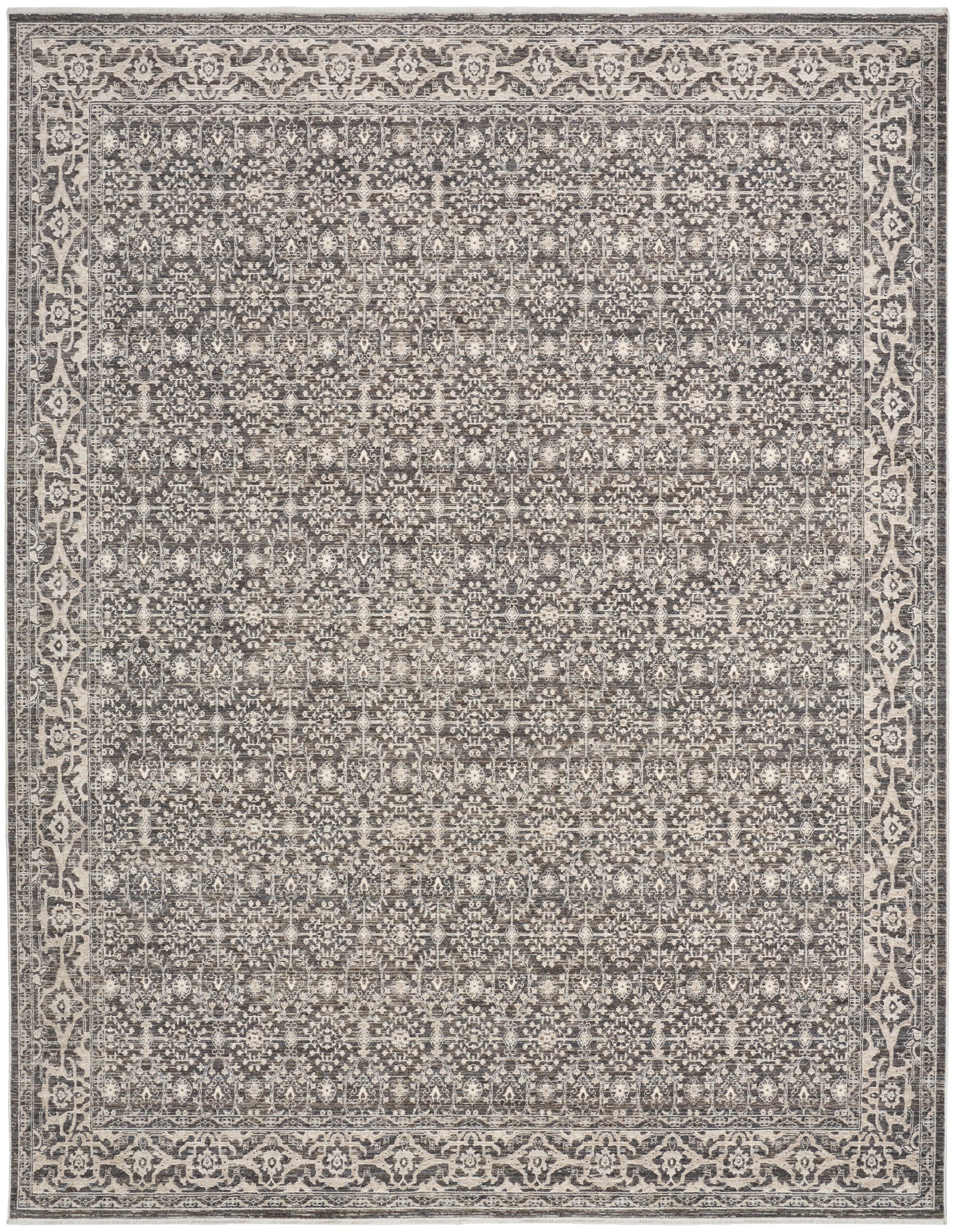 Gray and ivory rectangular area rug with dense geometric floral pattern and ornate border; vintage distressed look.