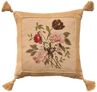 Beige embroidered throw pillow with floral bouquet, tan border & tassels at all four corners.