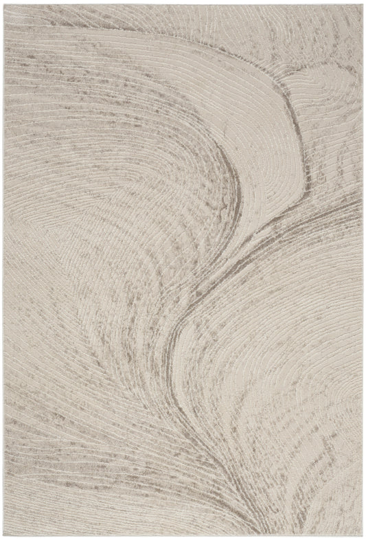 Beige rug with abstract swirl texture and cream and taupe marbling; modern pattern, 5' x 7'.