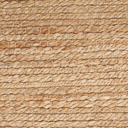 Close-up of natural jute rope weave in beige and tan, rustic braided texture.