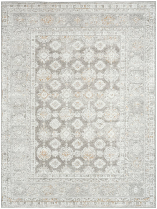 Rectangular woven rug in muted gray, ivory and tan with a traditional Oriental medallion pattern and distressed finish.