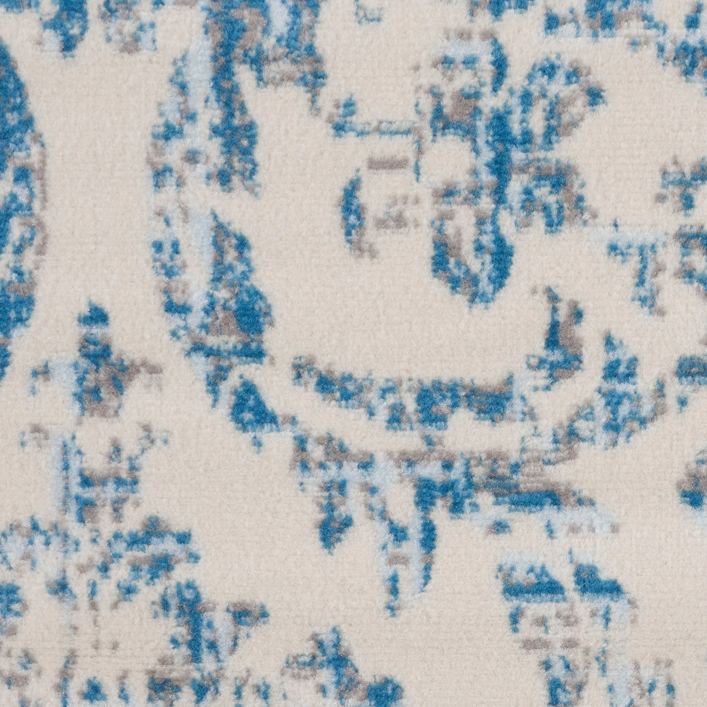 Cream rug with a distressed blue damask floral pattern, vintage style, 8' round rug