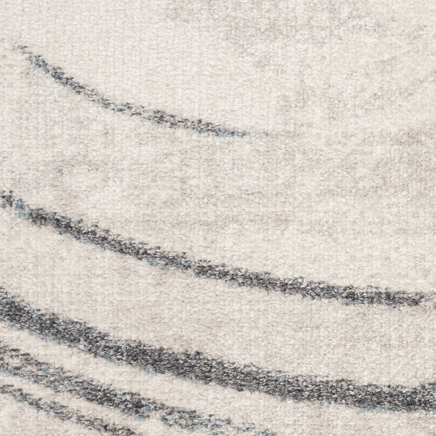Cream textured rug with soft pile and dark charcoal curved stripes in a modern abstract pattern.