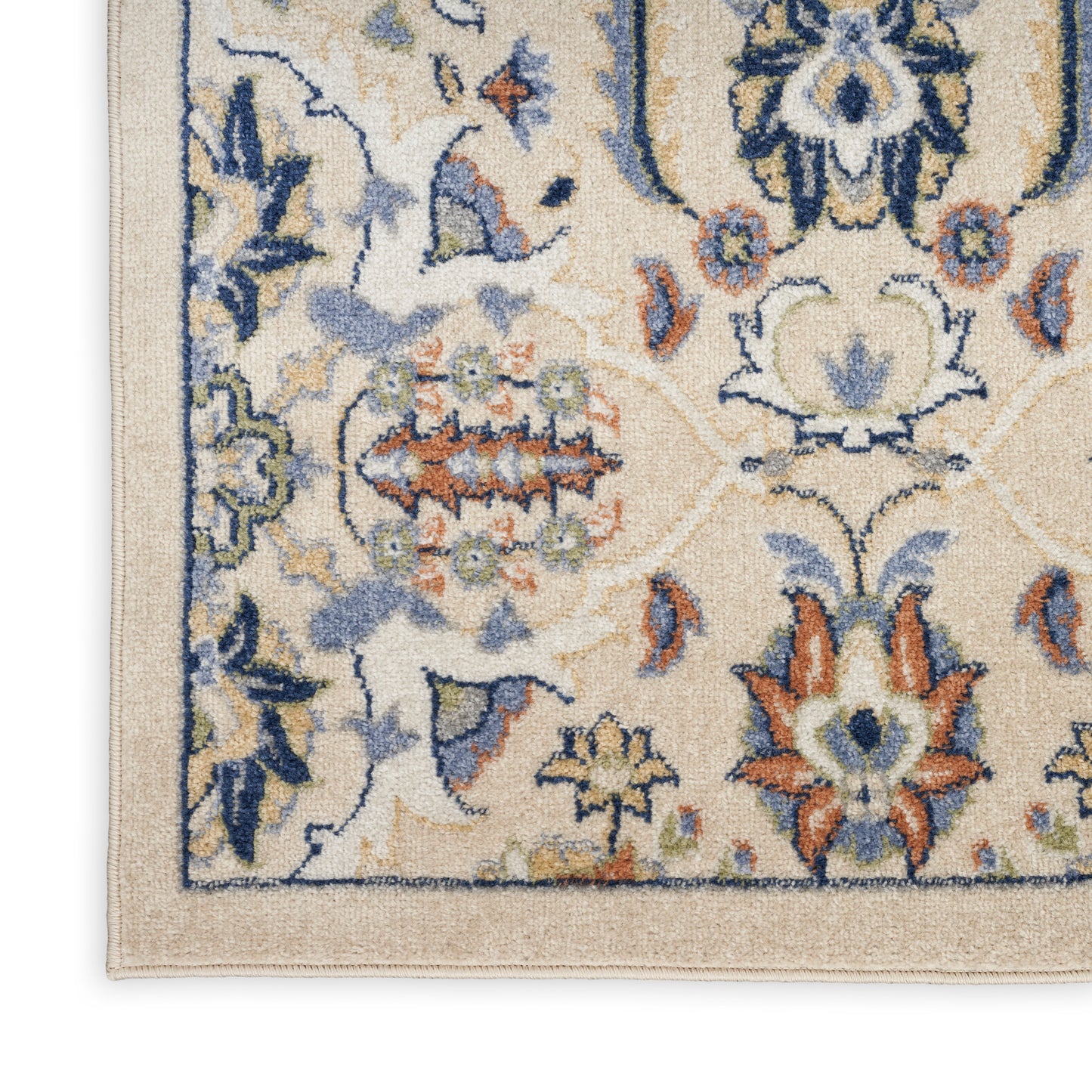 Beige oriental wool rug corner with blue, orange & green floral motifs and decorative border; classic home decor.