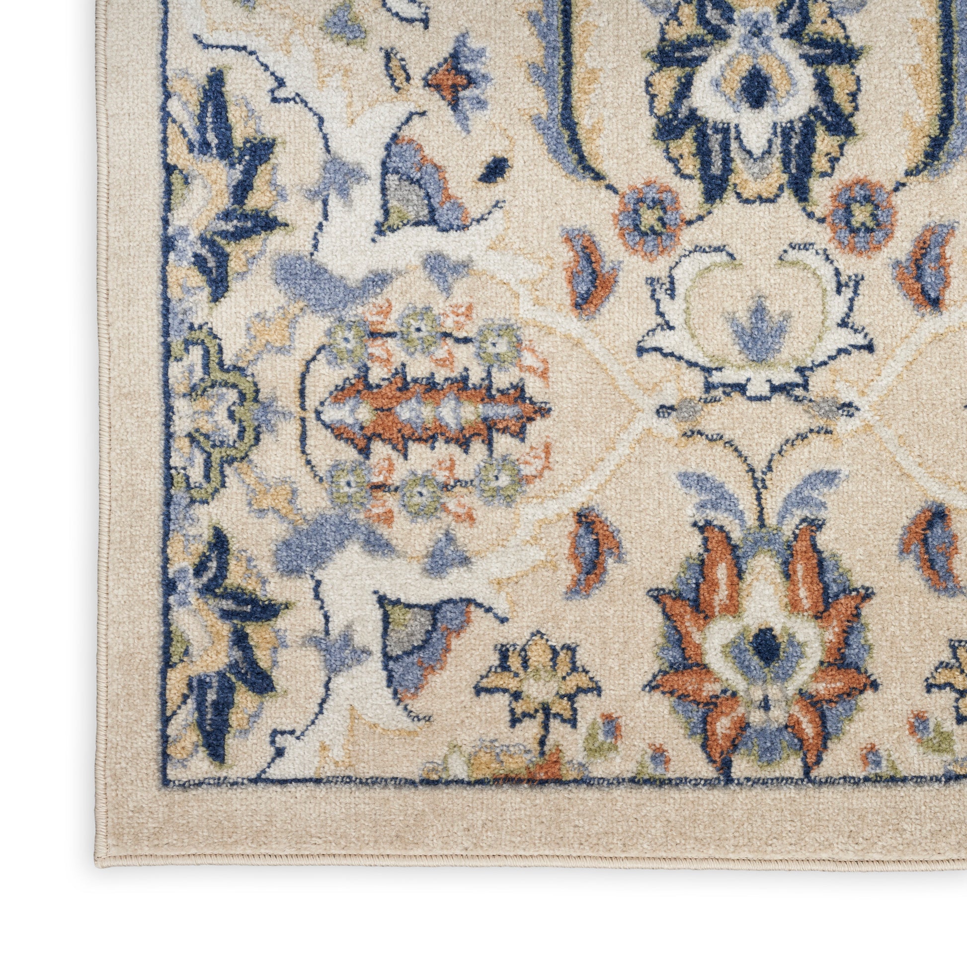 Beige oriental wool rug corner with blue, orange & green floral motifs and decorative border; classic home decor.