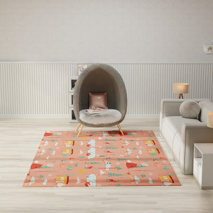 Gray oval pod chair with pink cushion on a peach rug featuring white animals and colorful houses in a modern living room.