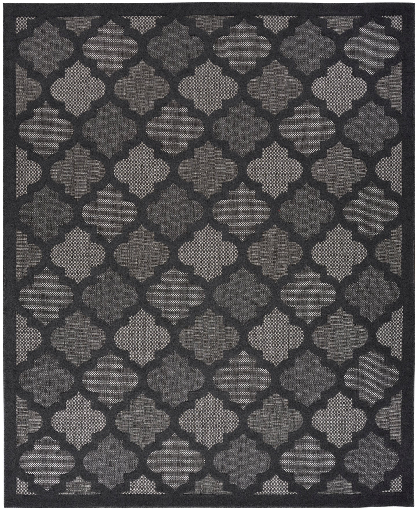 Dark gray & black geometric quattrofoil trellis rug with a textured woven pattern & border