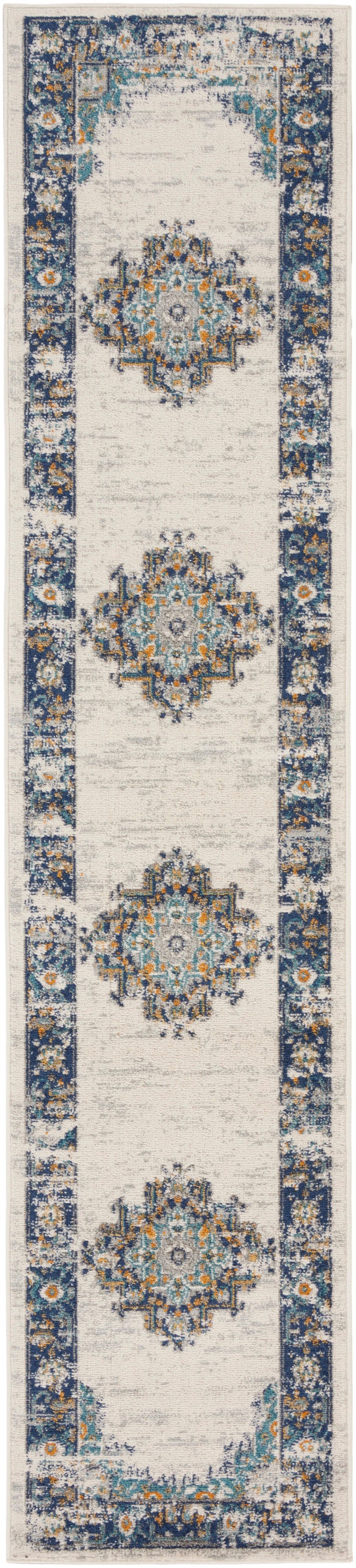 Long beige oriental runner rug with a navy border, turquoise and orange medallions, vintage distressed look.