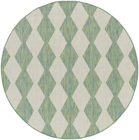 Round rug with beige diamonds on a green textured background and a thin green border.