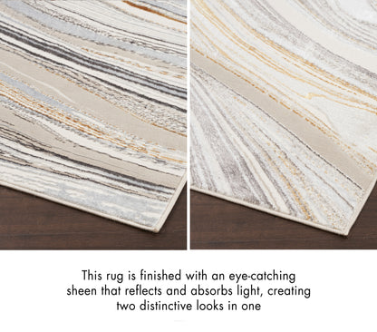 Beige, gray and gold abstract striped rug with a shimmering dual-tone finish and finished edge.