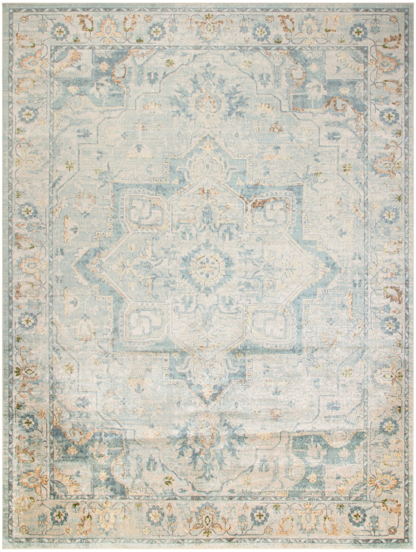 Rectangular distressed ivory-blue oriental area rug with central medallion and faded border; vintage-inspired decor.
