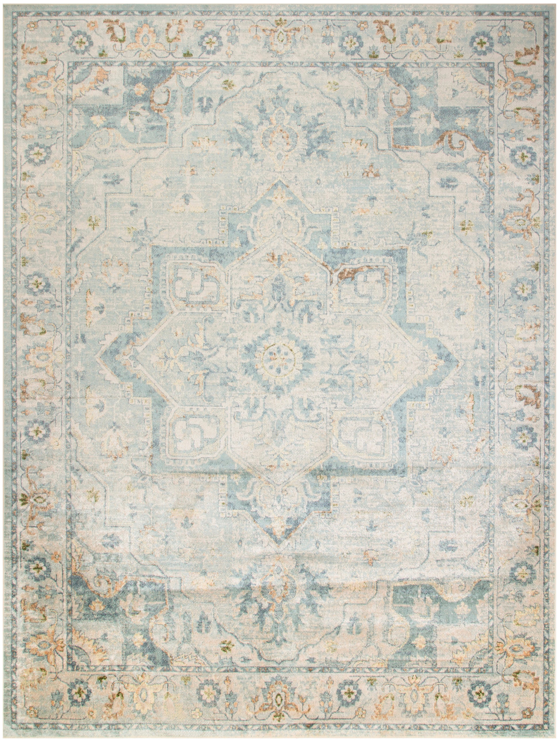 Rectangular distressed ivory-blue oriental area rug with central medallion and faded border; vintage-inspired decor.