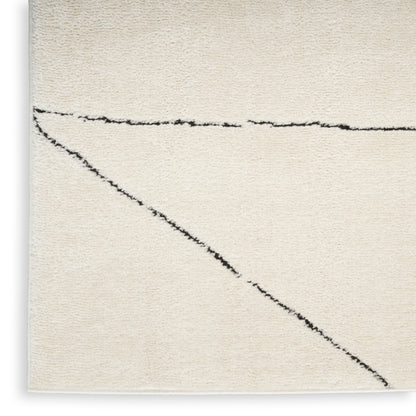Cream textured rug with black abstract diagonal and horizontal lines; soft wool-like pile, modern minimalist area rug