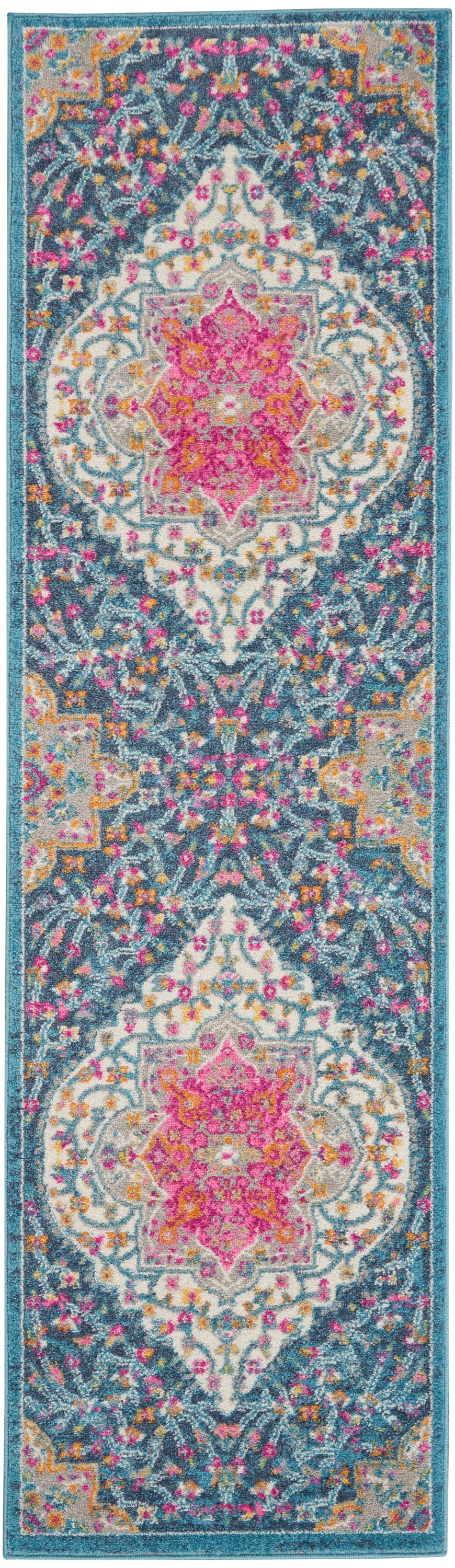 Long oriental-style rug runner with teal border, pink and magenta medallions, ivory floral motifs, and a vibrant multicolor pattern.