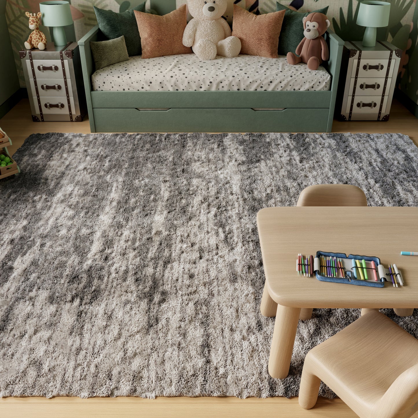 Soft gray shag rug in a kids' room with light wood table and chair, pastel-green sofa bed, polka-dot bedding, and plush bears.