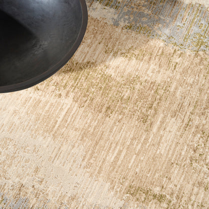Beige patterned rug with green and blue accents.